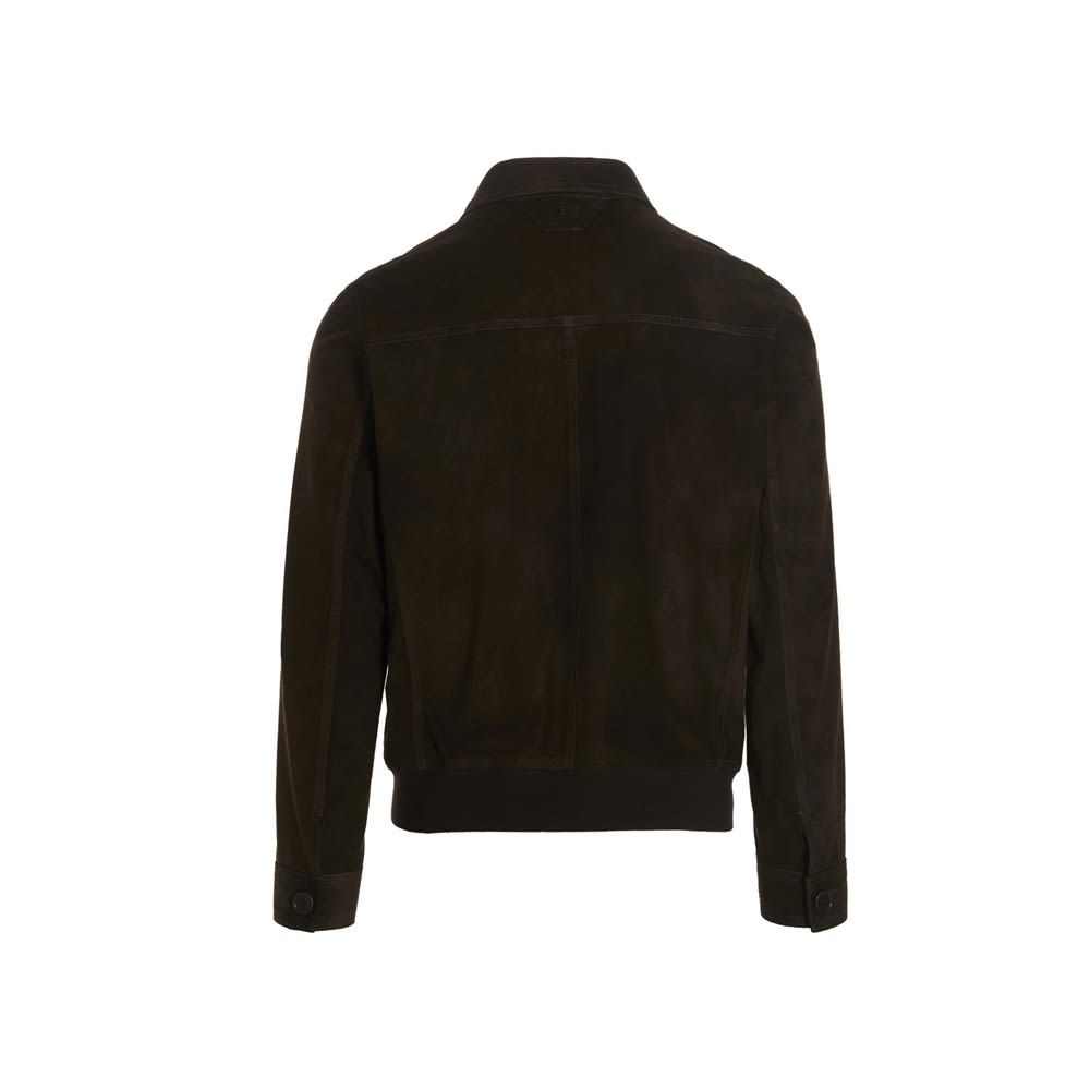 Suede bomber jacket with tonal button closure, elastic waistband and shirt collar.