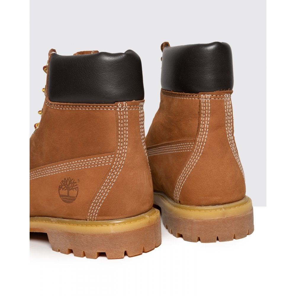 Here it is: the original Timberland® boot that helped start it all nearly forty years ago. Admittedly we've made a few improvements over the years, such as the addition of our exclusive anti-fatigue technology for all-day comfort, but our 6-Inch boots remain just as sturdy and dependable as ever. They're crafted in premium waterproof leather with seam-sealed construction to keep your feet dry, whatever the elements throw at you. Famed for their long-lasting durability, our 6-Inch premium boots will stand up to a beating in mud, rain, sand and snow and keep coming back for more.
Premium full-grain leather upper for rugged durabilityWaterproof seam-sealed construction is guaranteed to keep feet dry in any weatherRustproof hardware for durability and an authentic Timberland lookPadded collar for a comfortable fit around the ankleTextile lining and footbed cover for breathabilityEVA footbed for lightweight cushioning, shock absorption and all-day comfortRubber lug outsole for traction and durabilitySteel shank for arch support