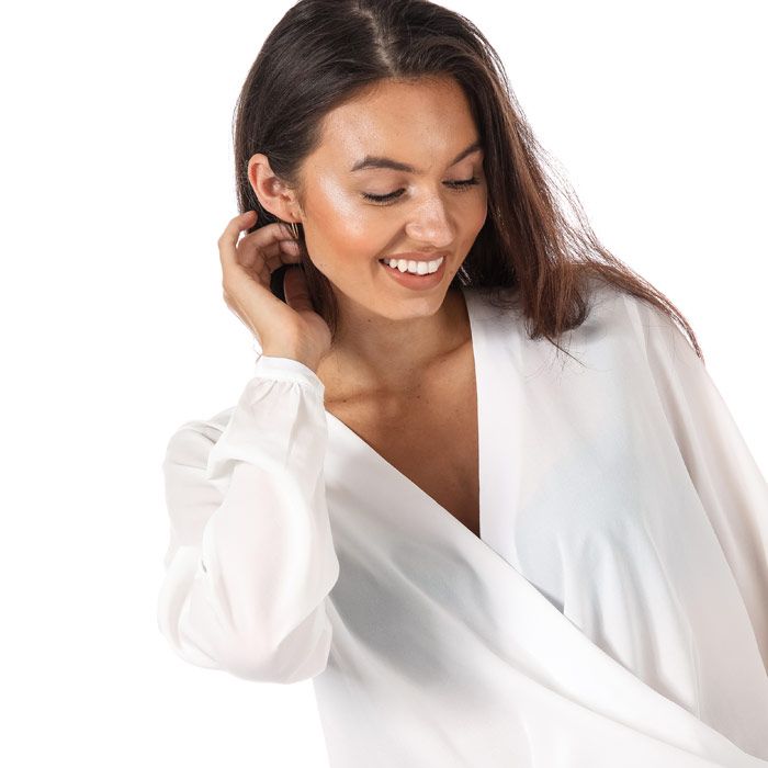 Womens Only Toscany Wrapover Blouse in cloud dancer.<BR><BR>- Flattering drapey blouse crafted in a soft silky fabric.<BR>- V-neck with wrapover design.<BR>- Long sleeves with buttoned cuffs.<BR>- Elasticated at waist.<BR>- Loose fit.<BR>- Measurement from shoulder to hem: 21in approximately.<BR>- 100% Polyester.  Machine washable.<BR>- Ref: 15162702<BR><BR>Measurements are intended for guidance only.