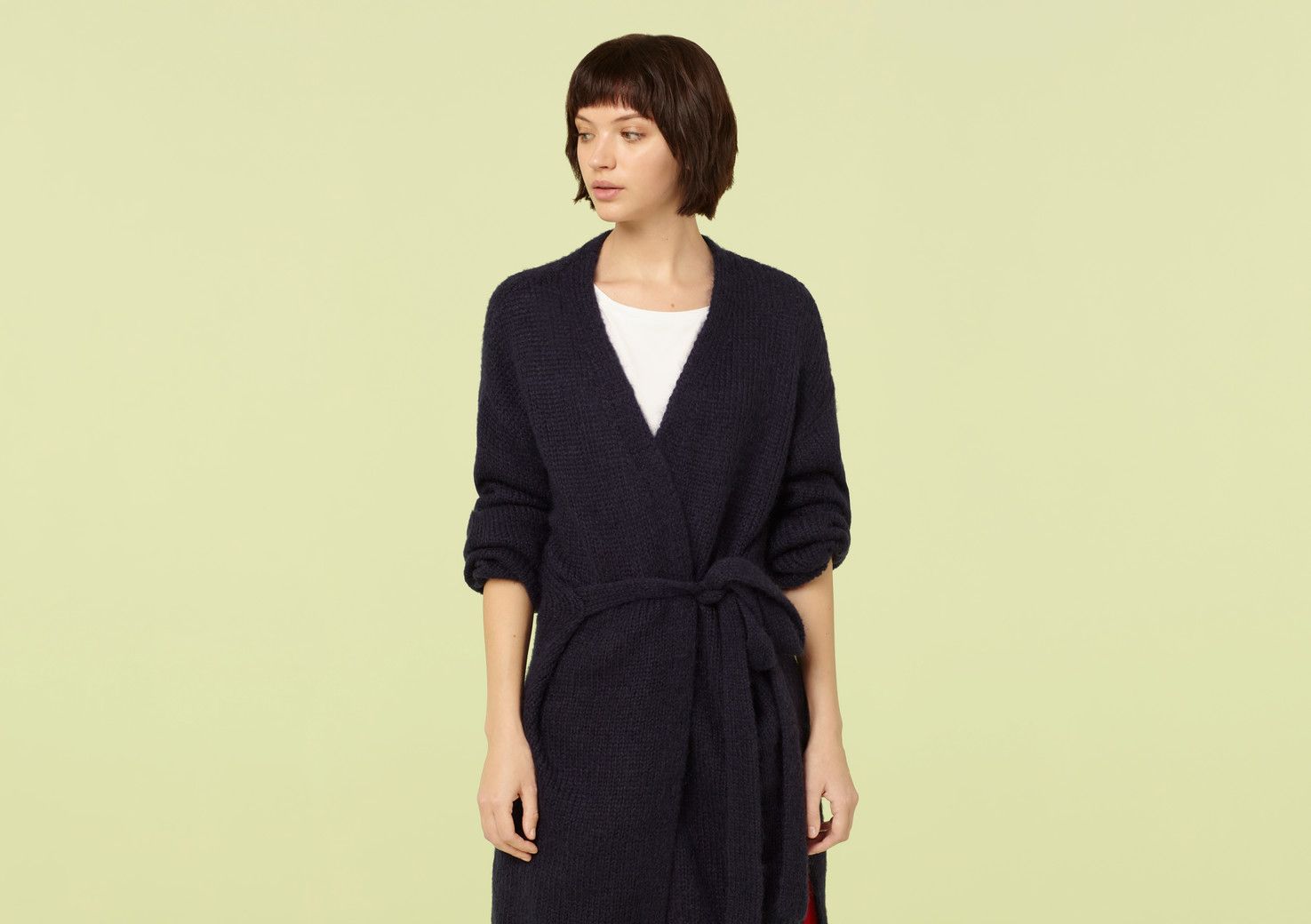 The humble cardigan gets a winter-ready makeover in the form of our Laurel design. Made from soft and cosy mohair-blend fabric, this chic longline style belts at the waist for a shapely finish or can be worn open for a loose and slouchy look.


Model is 5'7