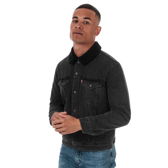 Mens Levi’s Embossed Logo Sherpa Trucker Jacket in black.<BR><BR>- Sherpa-lined collar and body.<BR>- Full snap button fastening with branded metal shanks.<BR>- Long sleeves with quilted lining and snap button cuffs.<BR>- Snap-flap chest pockets.<BR>- Side hand pockets.<BR>- Back waistband tabs for an adjustable fit.<BR>- Embossed Levi’s logo on reverse.<BR>- Levi’s logo tab at left chest pocket.<BR>- Standard fit.<BR>- Body: 100% Cotton.  Sherpa: 100% Polyester.  Sleeve lining: 100% Polyamide.  Sleeve filling: 100% Polyester. Machine washable. <BR>- Ref: 16365-0124