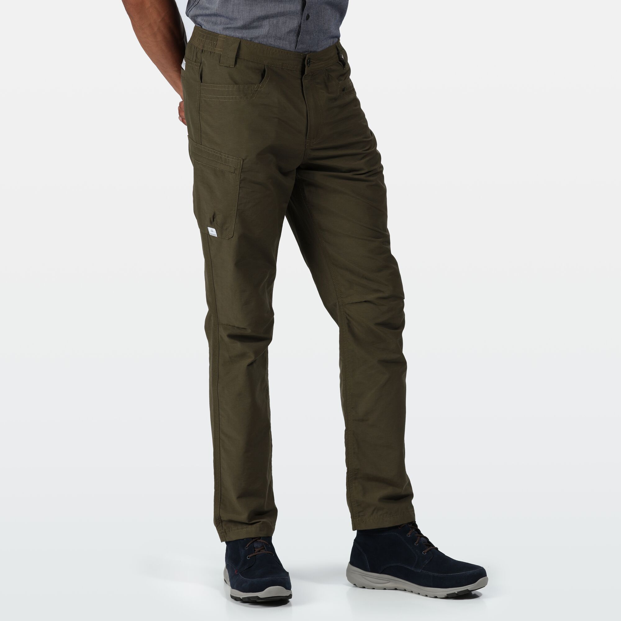 Material: Coolweave 70% Cotton/30% Polyester ripstop fabric. Lightweight trousers with button closure, zip fly and part-elasticated waist. Multi pocketed.