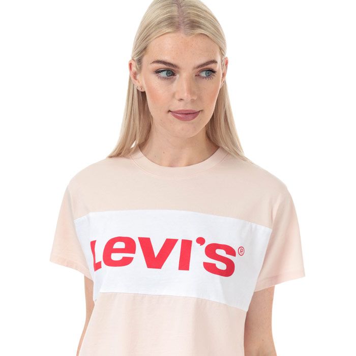 Womens Levi’s Colourblock Varsity T-Shirt in peach blush.<BR><BR>- Ribbed crew neck.<BR>- Drop shoulder.<BR>- Short sleeves. <BR>- Large Levi’s logo printed to chest.<BR>- Levi’s logo tab to side.<BR>- Tonal back neck tape.<BR>- Slightly cropped length.<BR>- Relaxed fit. <BR>- Measurement from shoulder to hem: 21“ approximately. <BR>- 100% Cotton.  Machine washable.<BR>- Ref: 18890-0001<BR><BR>Measurements are intended for guidance only.