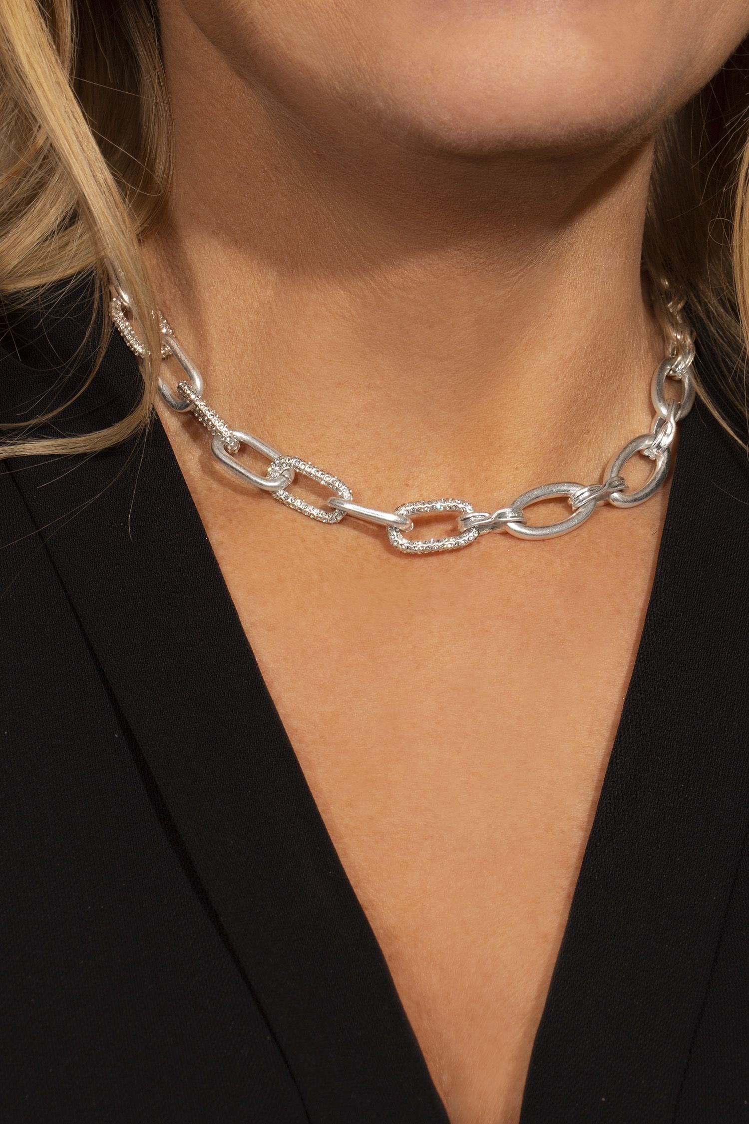 Simple and stunning, this silver chunky necklace features subtle sparkle with pave encrusted links on one half. Strong but delicate, it's such an on trend look right now and perfect for the winter months when we need our jewellery to really shine through. The 16 inch silver plated chain features a lobster clasp fastening and 3 inch extender so you can adjust it for your look. It also comes with the most perfect matching bracelet! When it doubt, go simple and style it out.