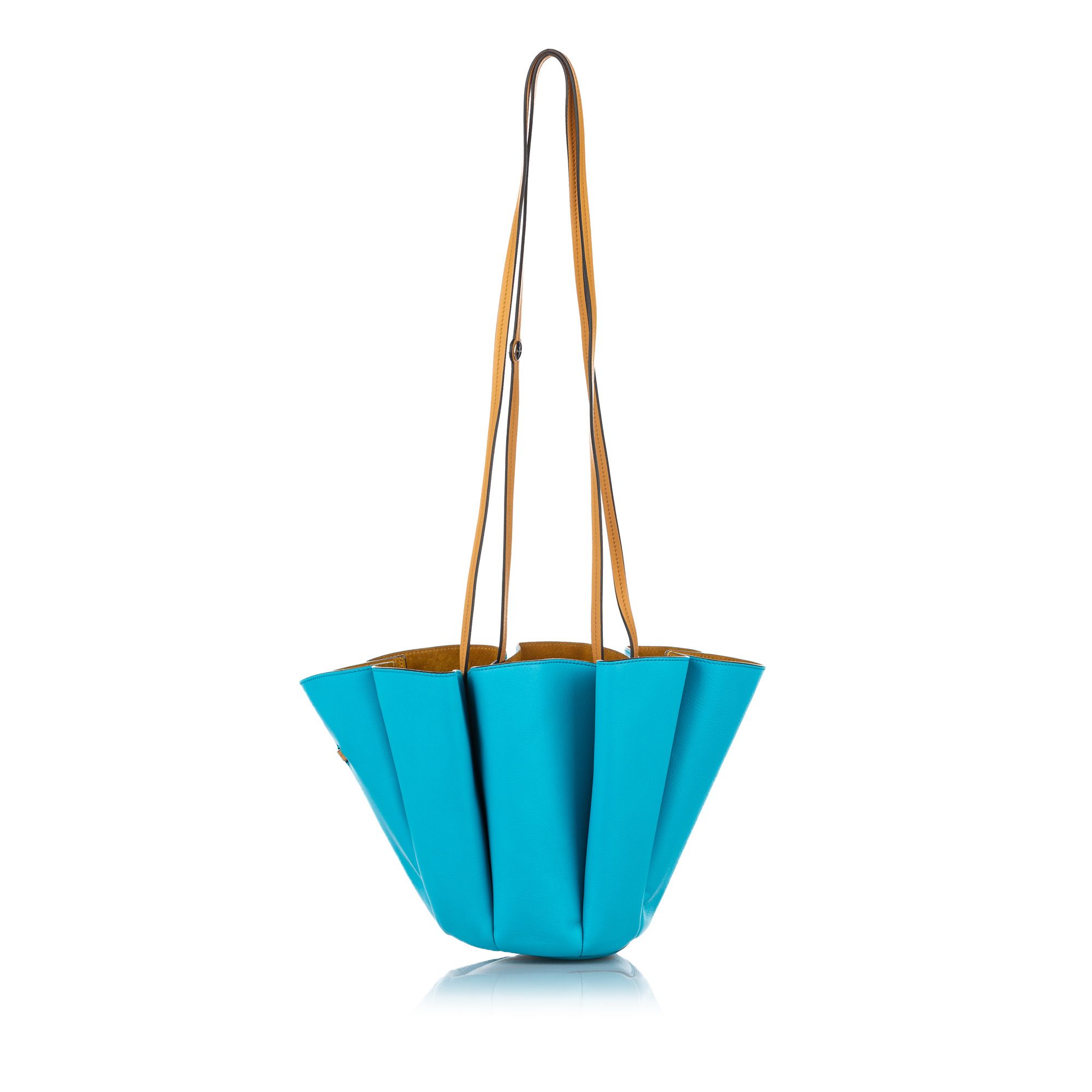 VINTAGE. RRP AS NEW. The Margeurite Bicolor bucket bag features a leather body, flat straps, Mother and Child motif print at the base and drawstring closure.Exterior back is discolored. Exterior front is discolored.

Dimensions:
Length 23cm
Width 32cm
Depth 14cm
Shoulder Drop 45cm

Original Accessories: Dust Bag

Serial Number: 32015
Color: Blue x Turquoise x Brown x Light Brown
Material: Leather x Calf
Country of Origin: France
Boutique Reference: SSU98275K1342


Product Rating: VeryGoodCondition