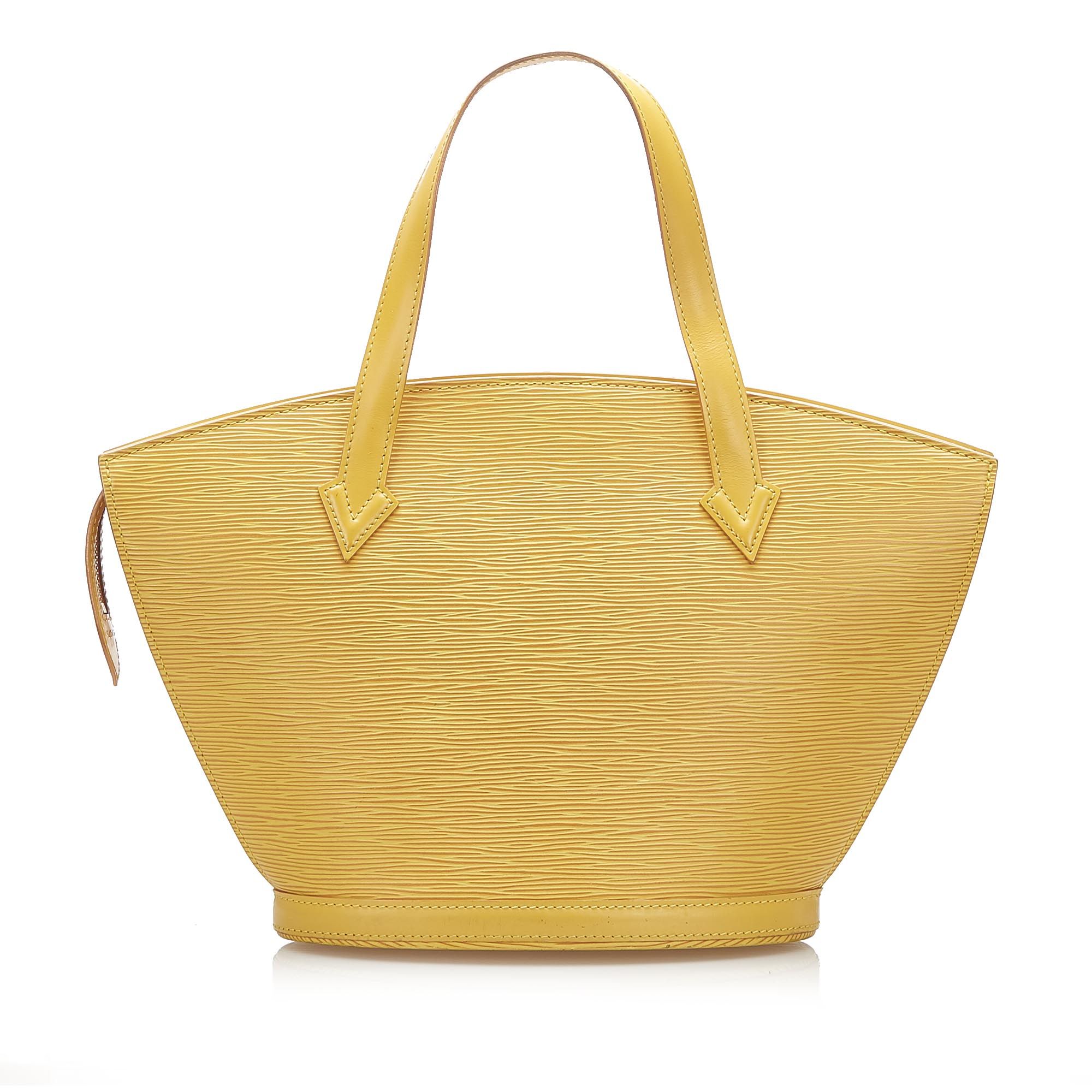 VINTAGE. RRP AS NEW. The Saint Jacques features an epi leather body, a top zip closure, and an interior slip pocket.
Dimensions:
Length 24cm
Width 38cm
Depth 10cm
Hand Drop 13cm
Shoulder Drop 24cm

Original Accessories: This item has no other original accessories.

Serial Number: VI0976
Color: Yellow
Material: Leather x Epi Leather
Country of Origin: France
Boutique Reference: SSU96303K1342


Product Rating: GoodCondition