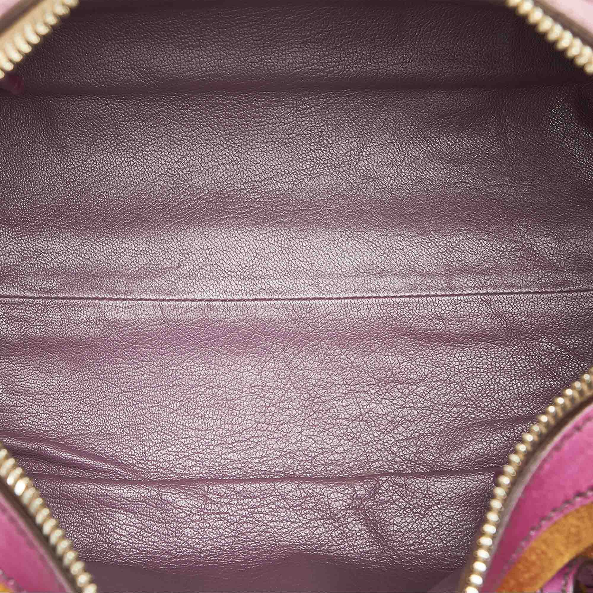 VINTAGE. RRP AS NEW. This shoulder bag features a suede leather body, flat leather straps, top zip closure, and an interior zip pocket.Exterior back is discolored and stained. Exterior bottom is discolored and stained. Exterior corners is discolored. Exterior front is discolored and stained. Exterior handle is discolored. Exterior side is discolored. Buckle is scratched and tarnished. Zipper is scratched and tarnished. Interior lining is discolored. Interior pocket is discolored.

Dimensions:
Length 14cm
Width 28cm
Depth 15cm
Shoulder Drop 23.5cm

Original Accessories: Name Tag, Dust Bag, Authenticity Card

Color: Brown x Purple
Material: Leather x Suede x Leather x Calf
Country of Origin: Italy
Boutique Reference: SSU95110K1342


Product Rating: GoodCondition