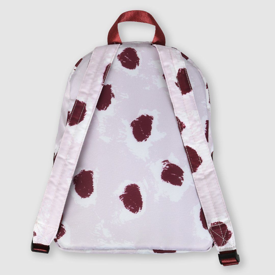 Kids backpack in our signature painted dot print in pink and burgundy featuring a zipped front pocket, adjustable padded straps and top carry grab handle. 