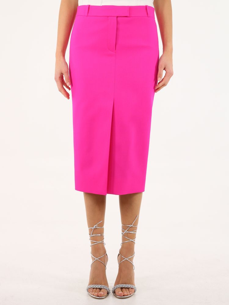 Cat fuchsia pencil skirt in crêpe with single vent, hook closure and concealed zipper.The model is 178cm tall and wears size 40. 