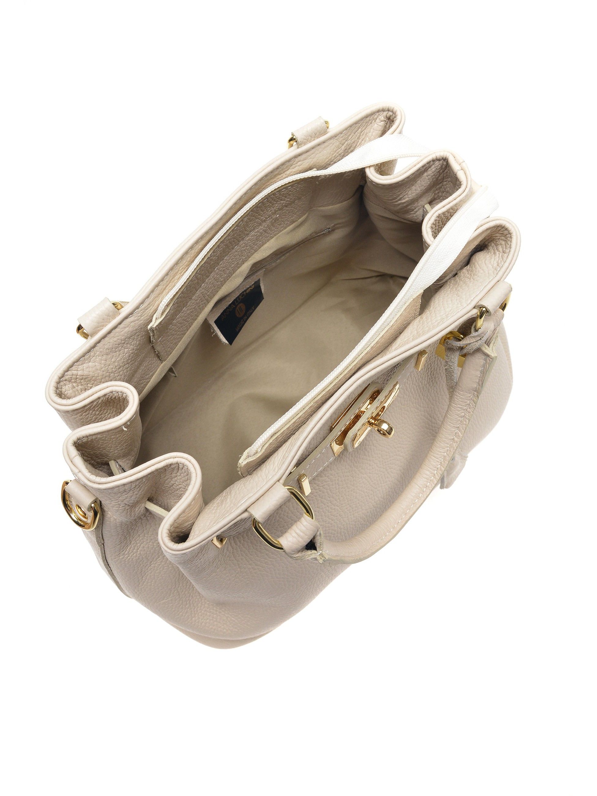 Handbag
100% cow leather
Top zip closure
Buckle detail
Inner zip pocket
Dimensions (L): 28.5x38x18 cm
Handle: 34 cm
Shoulder strap: 100 cm fix