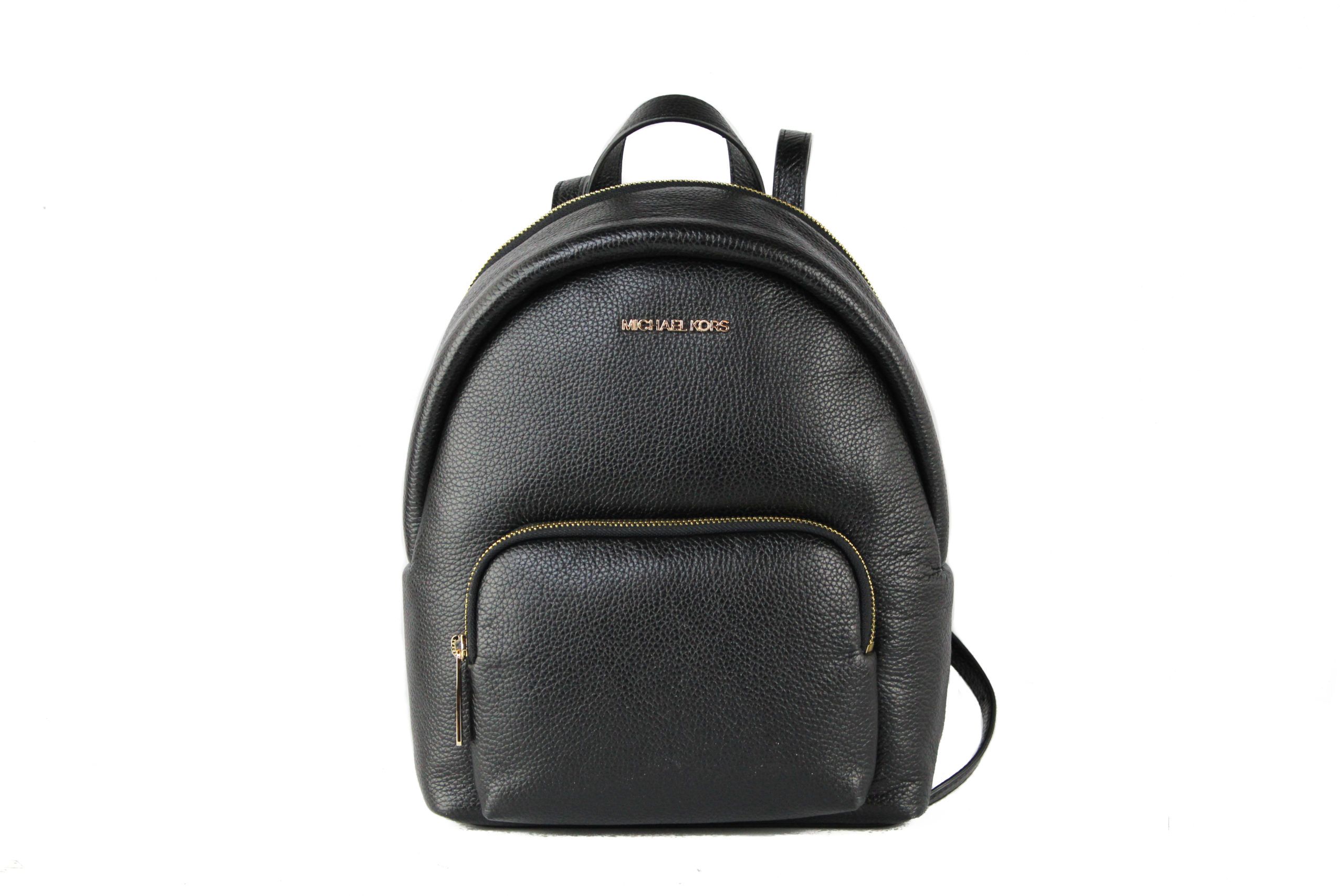 Brand New with Tags attached (100% Authentic). 
Style:. Michael Kors Erin Medium Leather Convertible Backpack (Black)
Material: PebbleLeather. 
Features: Inner Pockets, Exterior Zip Pocket, Adjustable/Convertible Straps. 
Measures: 26.67 cmL x 31.75 cm H x 12.7 cm D.
