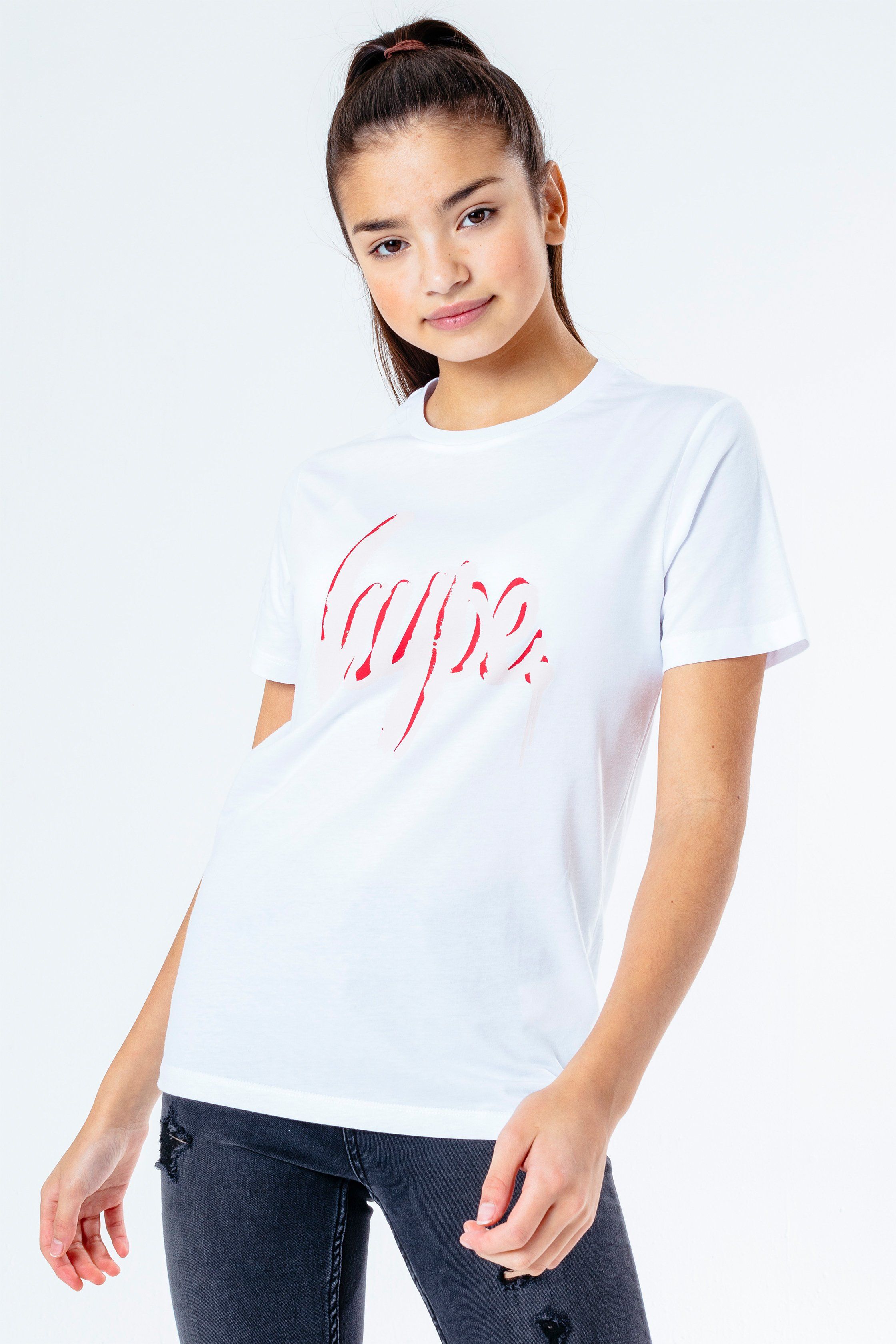 The HYPE. Spray Script kids t-shirt features a white, dark and light pink colour palette. Designed in a 100% cotton fabric base for the ultimate comfort in our standard unisex kids tee shape with a crew neckline and short sleeves. The design features our iconic HYPE. script logo with a graffiti-spray inspired overlay across the front. Wear with kids joggers for a 'Netflix n Chill' Sunday, or opt for denim jeans when you've got plans. Machine wash at 30 degrees.