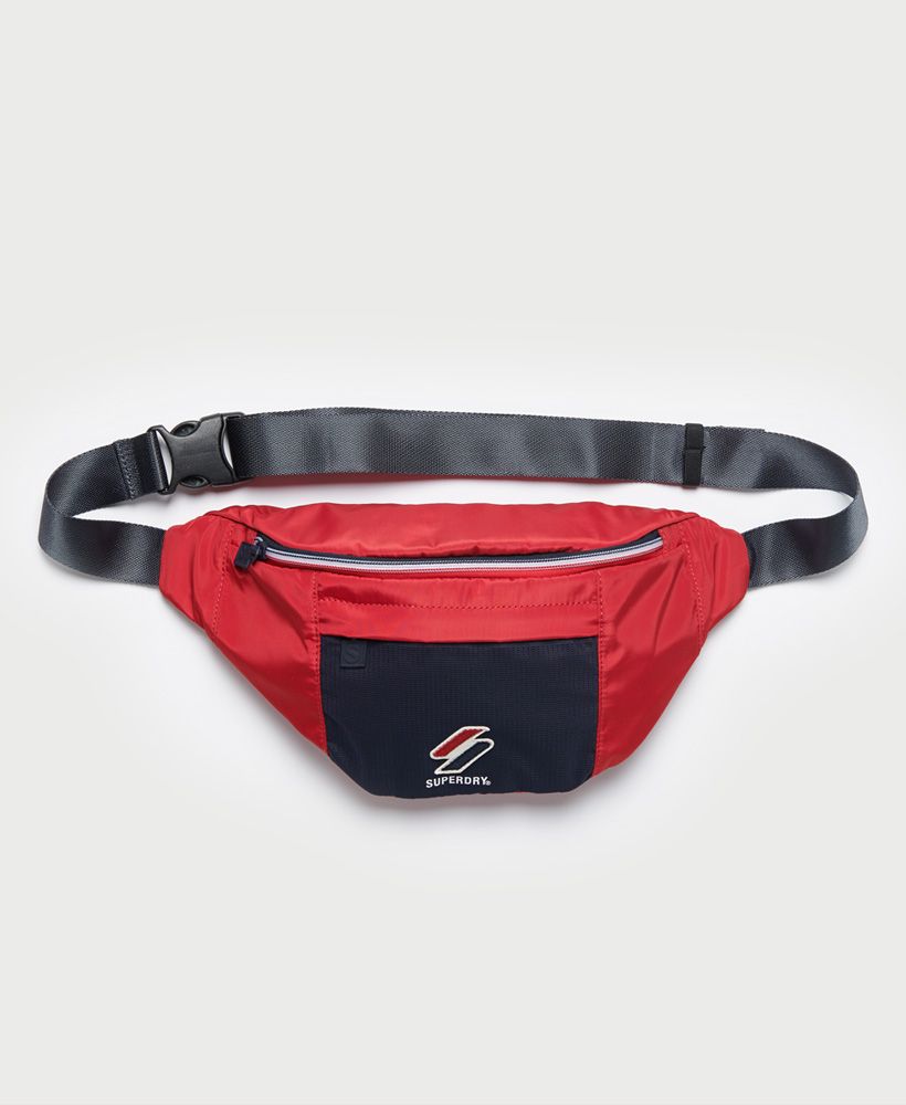 Keep your essentials close this season with the Sportstyle bum bag.Main zipped compartmentFront zipped pocketAdjustable waist strap with buckle fasteningH: 18cm x W: 41cm x D: 10cm