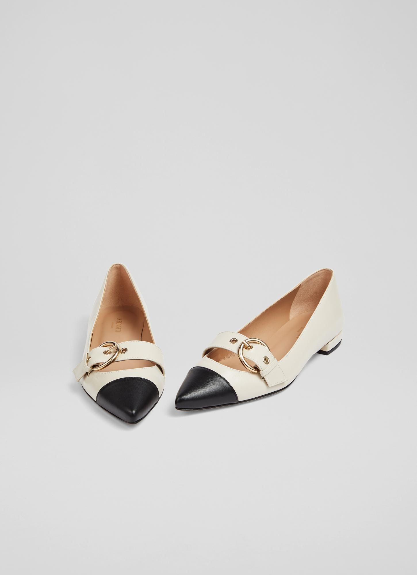 Elevating the classic flat, our Milly pointed pumps are perfect for taking you between the seasons. Crafted in Spain from beautiful cream nappa leather, they have a pointed toe with black leather toe cap detail, gold statement buckles and  flat heels. Effortless and elegant, wear them with dresses or tailored trousers as a smarter alternative to trainers.