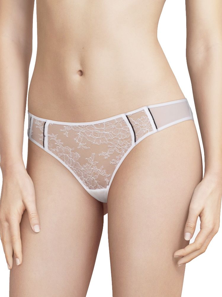 Part of the Clash collection, these Chantal Thomass briefs come in a White and Black colourway. Tanga style in a lightweight, breathable fabric. Made of 64% Polyamide, 36% Elastane and machine washable.