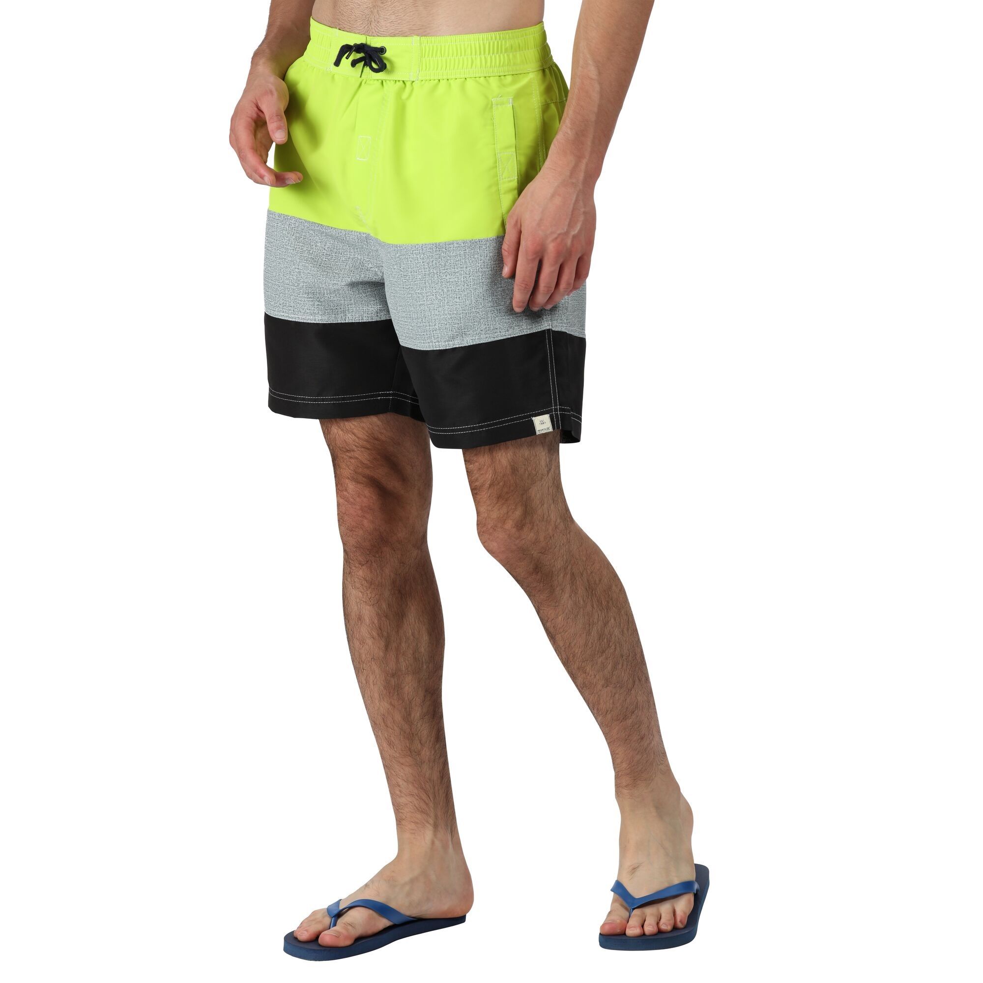 Material: 100% polyester taslan fabric. Quick drying fabric. Adjustable drawcord waist. 2 side pockets. 1 back pocket. Mesh brief liner with security pocket.