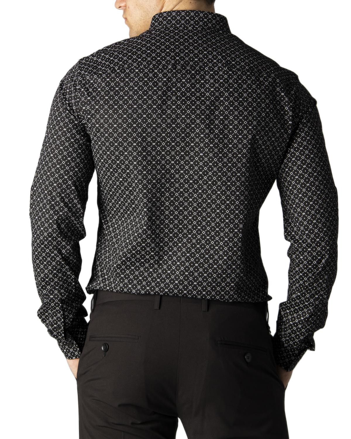 Brand: Armani Exchange
Gender: Men
Type: Shirts
Season: Spring/Summer

PRODUCT DETAIL
• Color: black
• Pattern: print
• Fastening: buttons
• Sleeves: long
• Collar: classic

COMPOSITION AND MATERIAL
• Composition: -97% cotton -3% elastane 
•  Washing: machine wash at 30°