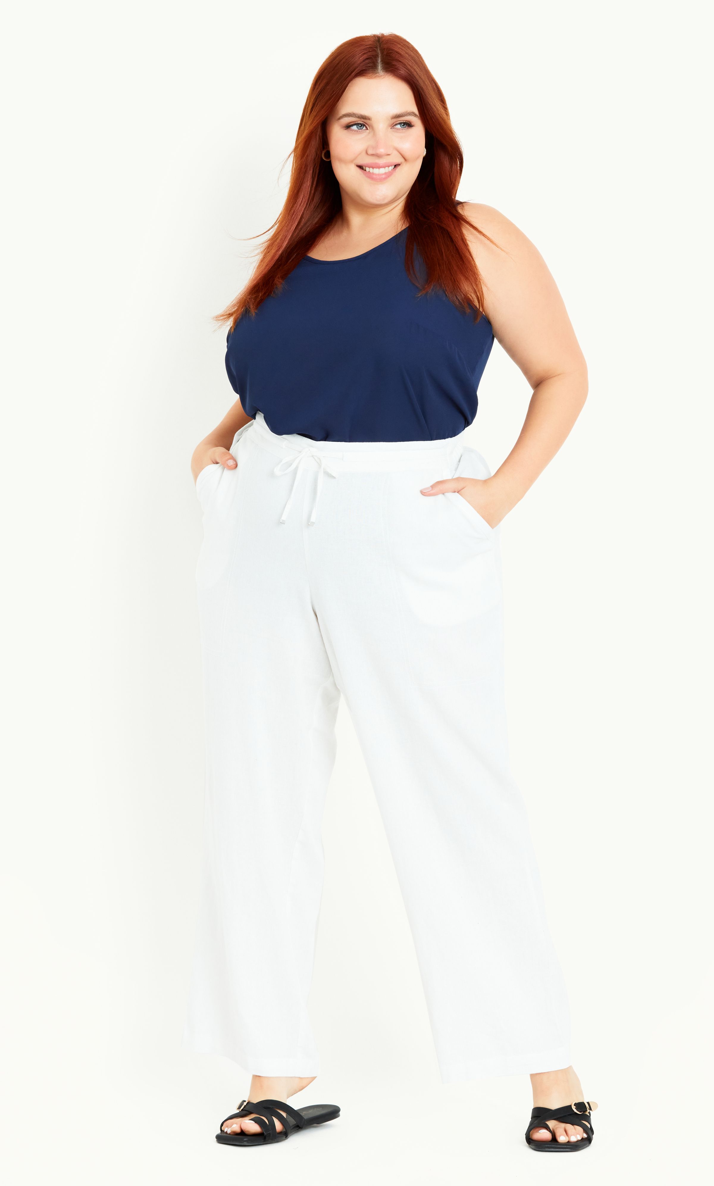 Keep your summer rotation on fleek with the oh-so breezy and versatile Relaxed Linen Blend Trouser! This stylish pair features an elasticated high waist cut, relaxed leg and convenient pockets, perfect for day-to-day wear. Key Features Include: - Elasticated waist with drawstring - Four pockets - Linen blend fabrication - Relaxed leg - Unlined - Pull up style - Ankle length Elevate your day look with a V-neck tee and some chic wedges.
