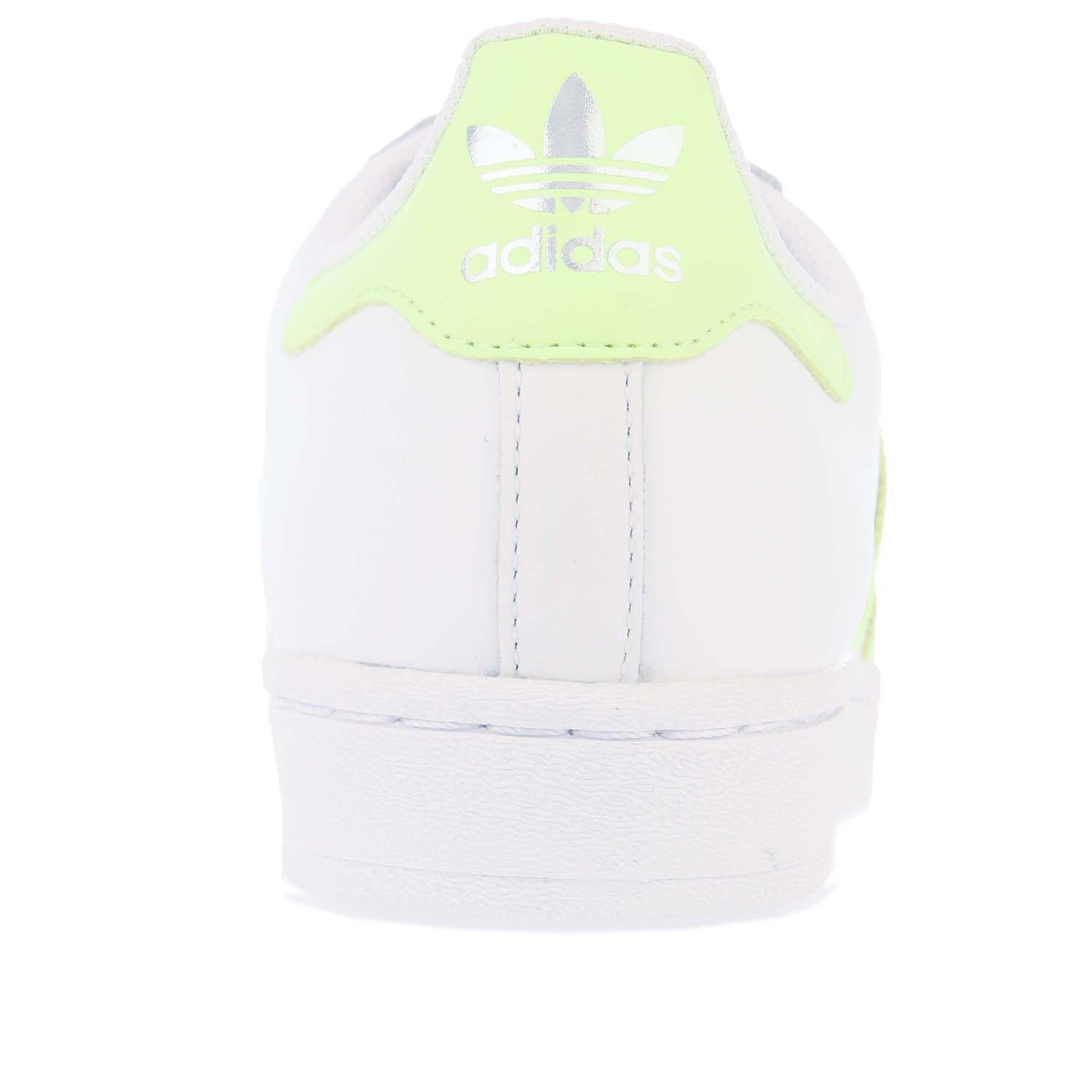 Womens adidas Originals Superstar Trainers in white yellow.- Leather upper.- Lace closure.- Regular fit.- Moulded sockliner.- Serrated 3-Stripes.- Trefoil logos to the tongue and heel. - Rubber sole. - Leather upper  Textile lining.- Ref.: FX6090