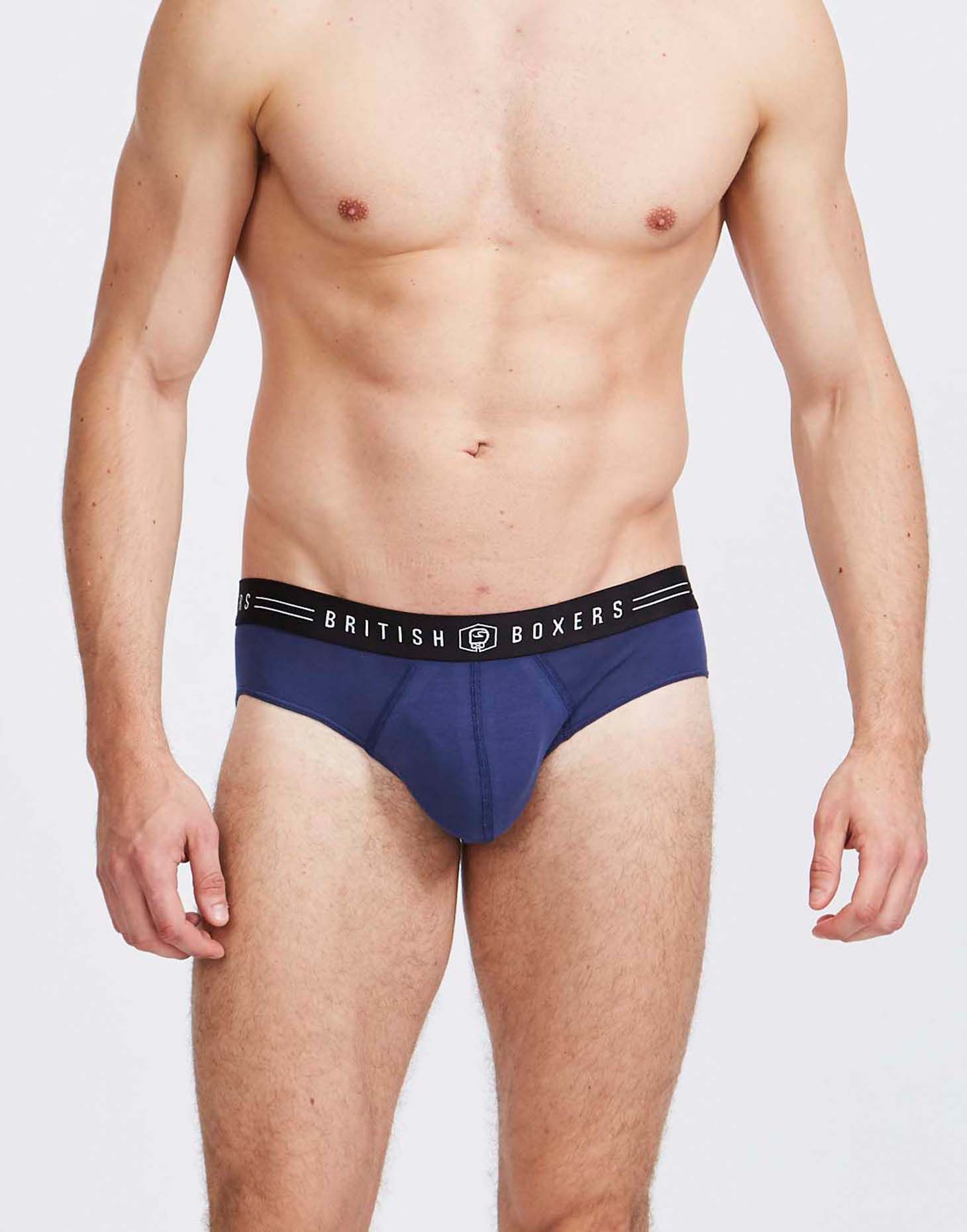 Our fitted men’s briefs are made from a wonderfully soft and stretchy blend of 95% premium 180gsm cotton and 5% elastane, which is hugely supportive right where you need it. They’re finished with a comfortable embroidered waistband featuring the British Boxers logo, and flat seams for an amazing feel against your skin. All our colours stay true wash after wash, never fading.  Choose your size and receive 4 pairs of men's briefs. You'll receive a random selection of plain colours, but rest assured they're all made from the same 180gsm, flat-seamed jersey we always use, all beautifully cut, and no garish patterns or horrendous colours will be included.  Available in sizes S - XXL.  95% cotton, 5% elastane.