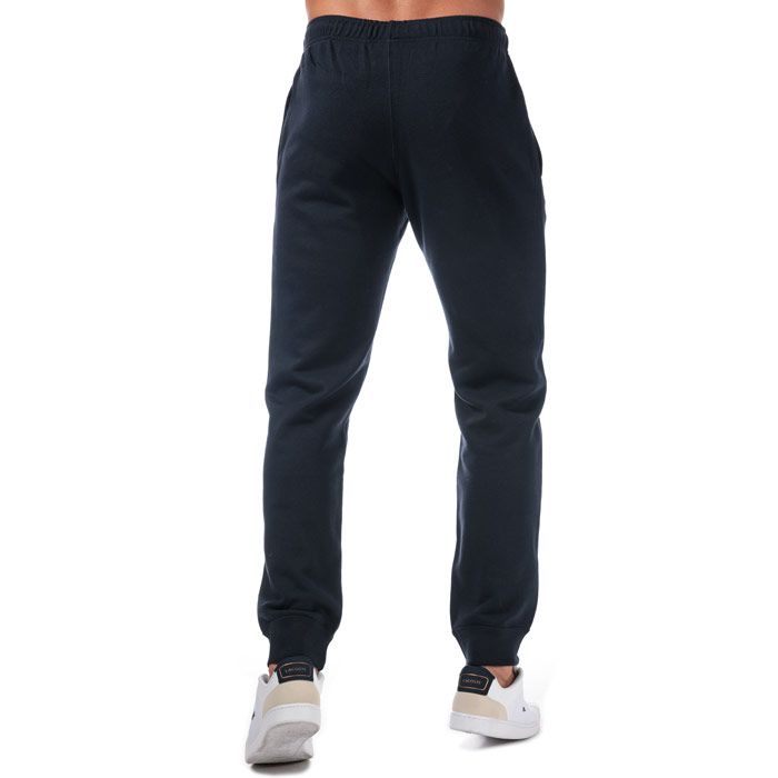 Mens Champion closed Hem Joggers in Navy.<BR><BR>- Elasticated rib waist.<BR>- Internal drawcords.<BR>- Pockets to side.<BR>- Ribbed cuffs.<BR>- Champion branding to left leg.<BR>- Inside leg 30in approximately<BR>- 63% Cotton  37% Polyester. Machine Washable.<BR>- Ref: 2115342192<BR><BR>Measurements are intended for guidance only.