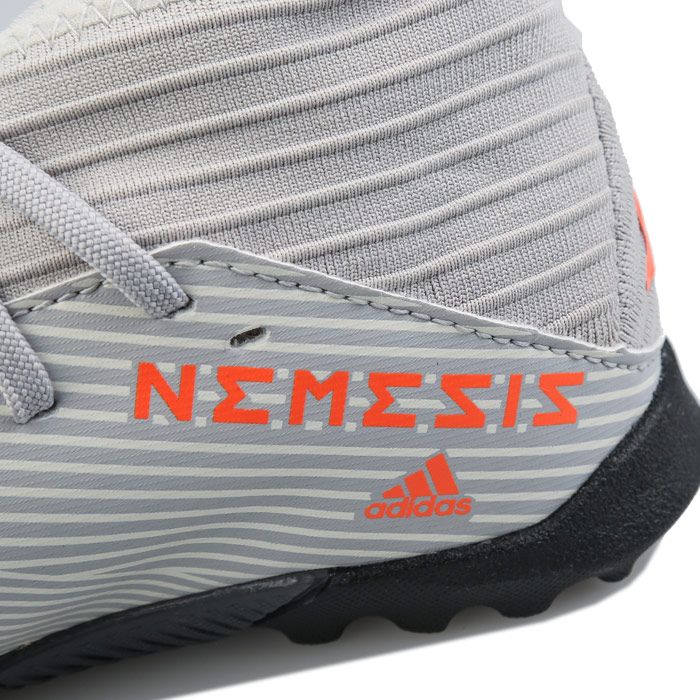 Children Boys adidas Nemeziz 19.3 Turf Football Boots in grey.- Soft synthetic mid-cut upper.- Lace fastening. - Regular fit.- EVA midsole. - 3 stripe detail to side. - Rubber outsole. - Synthetic Upper  Textile Lining  Synthetic Sole.- Ref.: EF8303