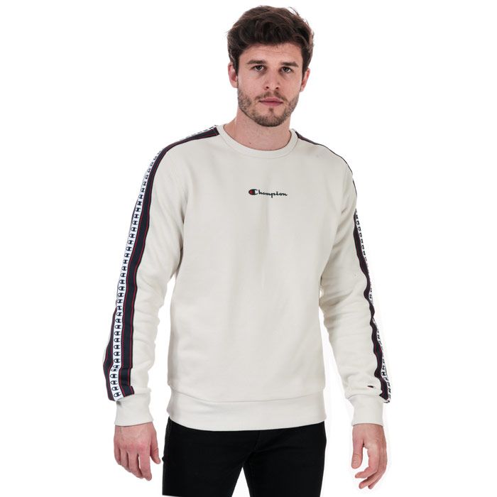 Mens Champion Stripe C Logo Tape Crew Sweatshirt in white. – Ribbed crew neck. – Long sleeves with taped detail. – Champion logo to chest. – Signature C logo embroidered above left cuff. – Ribbed cuffs and hem. – Comfort fit. – 100% Cotton.  Machine washable.  – Ref: 213416ES001