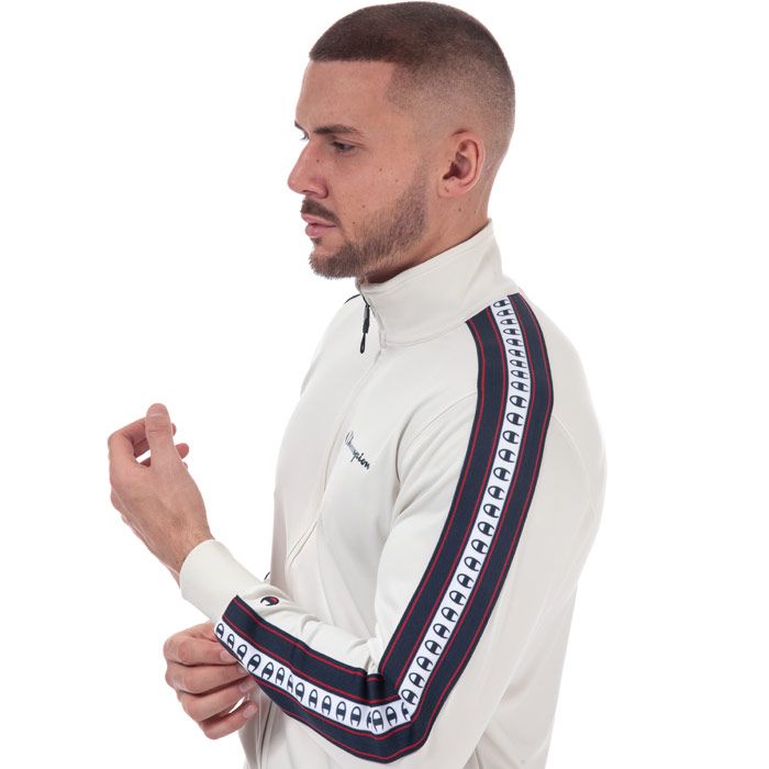 Mens Champion Taped Sleeve Track Top in white.<BR><BR>- Stand up collar with ribbed lining.<BR>- Full zip fastening.<BR>- Long sleeves with taped detail.<BR>- Champion script logo at left chest.<BR>- Signature C logo embroidered above left cuff.<BR>- Kangaroo style pockets to front.<BR>- Ribbed cuffs and hem.<BR>- Custom fit.<BR>- 100% Polyester.  Machine washable.<BR>- Ref: 213458 ES001