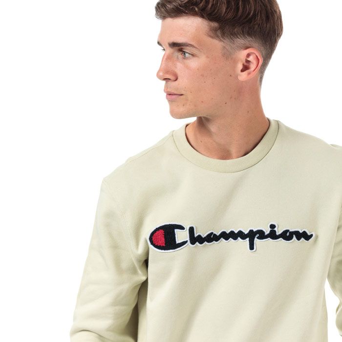 Mens Champion Garment Washed Crew Sweatshirt in green.<BR><BR>- Ribbed crew neck.<BR>- Long sleeves.<BR>- Cotton terry script logo to chest.<BR>- Signature C logo embroidered above left cuff.<BR>- Ribbed cuffs and hem.<BR>- Tonal back neck tape.<BR>- Comfort fit.<BR>- 100% Cotton.  Machine washable.<BR>- Ref: 213511 ES050