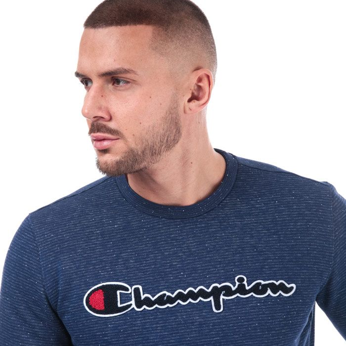 Mens Champion Large Logo Crew Sweatshirt in blue.<BR><BR>- Ribbed crew neck.<BR>- Long sleeves.<BR>- Allover stripe design.<BR>- Cotton terry script logo to chest.<BR>- Signature C logo embroidered above left cuff.<BR>- Ribbed cuffs and hem.<BR>- Tonal back neck tape.<BR>- Comfort fit.<BR>- 59% Cotton  41% Polyester.  Machine washable.<BR>- Ref: 213512 BZ011