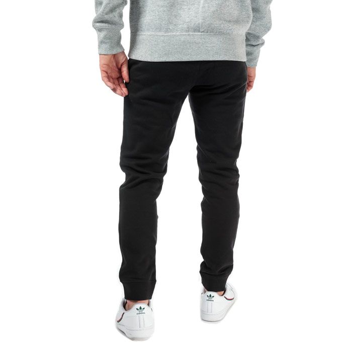 Mens Champion Large Logo Jog Pants in black.<BR><BR>- Ribbed elasticated waist with drawcord.<BR>- Side seam pockets.<BR>- Cotton terry script logo at left leg.<BR>- Signature C logo embroidered at left hip.<BR>- Ribbed cuffs.<BR>- Regular fit.<BR>- 100% Cotton.  Machine washable.<BR>- Ref: 213515 KK001