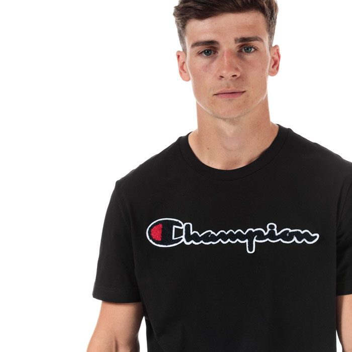 Mens Champion Large Logo T-Shirt in black.<BR><BR>- Ribbed crew neck.<BR>- Short sleeves.<BR>- Cotton terry script logo to chest.<BR>- Signature C logo embroidered at left sleeve.<BR>- Tonal back neck tape.<BR>- Comfort fit.<BR>- 100% Cotton.  Machine washable.<BR>- Ref: 213521 KK001