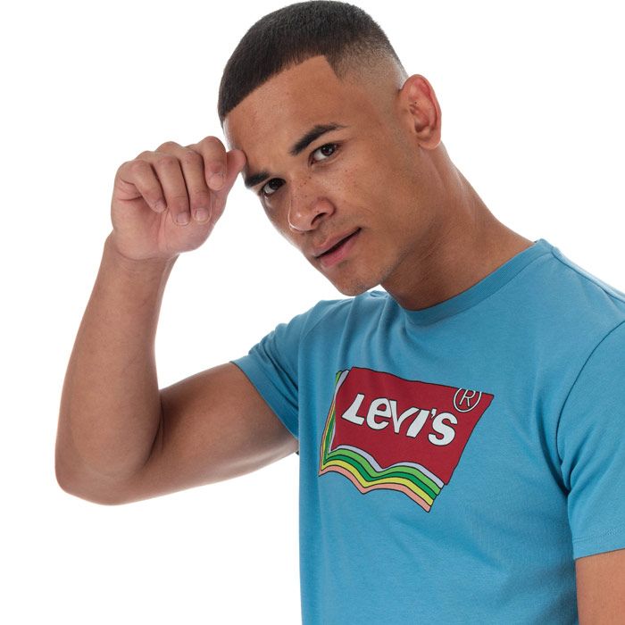 Mens Levi’s Graphic Varsity T-Shirt in Parisian blue.<BR><BR>- Ribbed crew neck.<BR>- Short sleeves. <BR>- Levi's graphic logo printed to front.<BR>- Levi’s logo tab to side.<BR>- Tonal back neck tape.<BR>- Soft and comfortable cotton jersey fabric.<BR>- 100% Cotton.  Machine washable.<BR>- Ref: 22491-0806