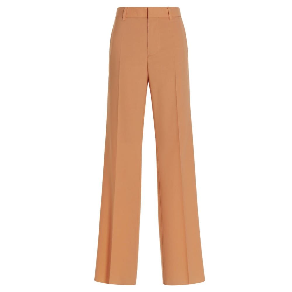 Slouchy wool blend pants with regular waist and zip and button fly.