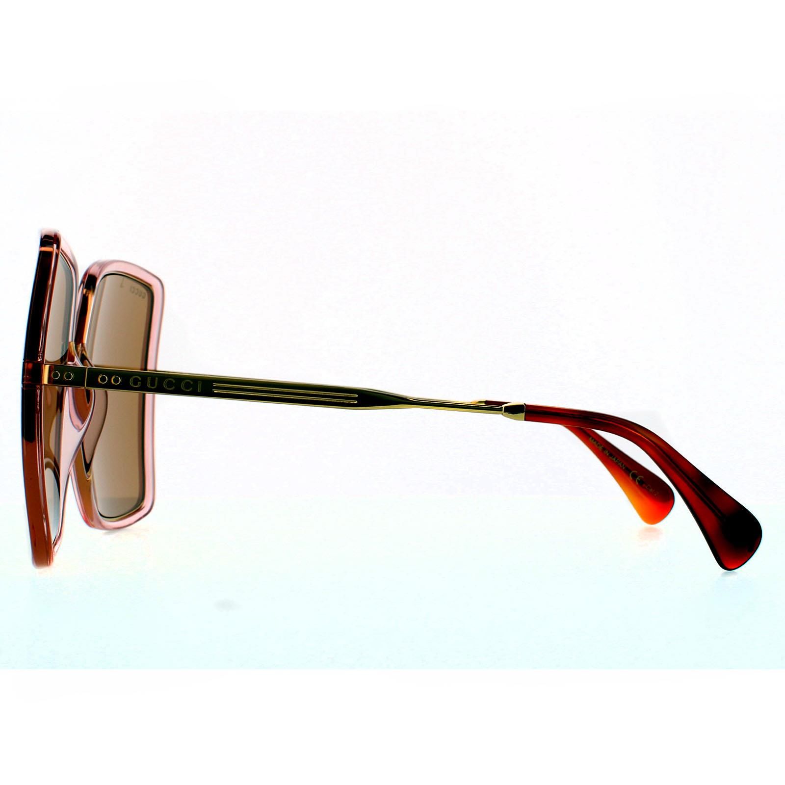 Gucci Square Womens Pink Crystal and Gold  Brown Sunglasses Gucci have super oversized square lenses with plastic rims and contrasting slim metal temples and bridge. Stripes are engraved into the  metal, as well as the Gucci logo on the temples.