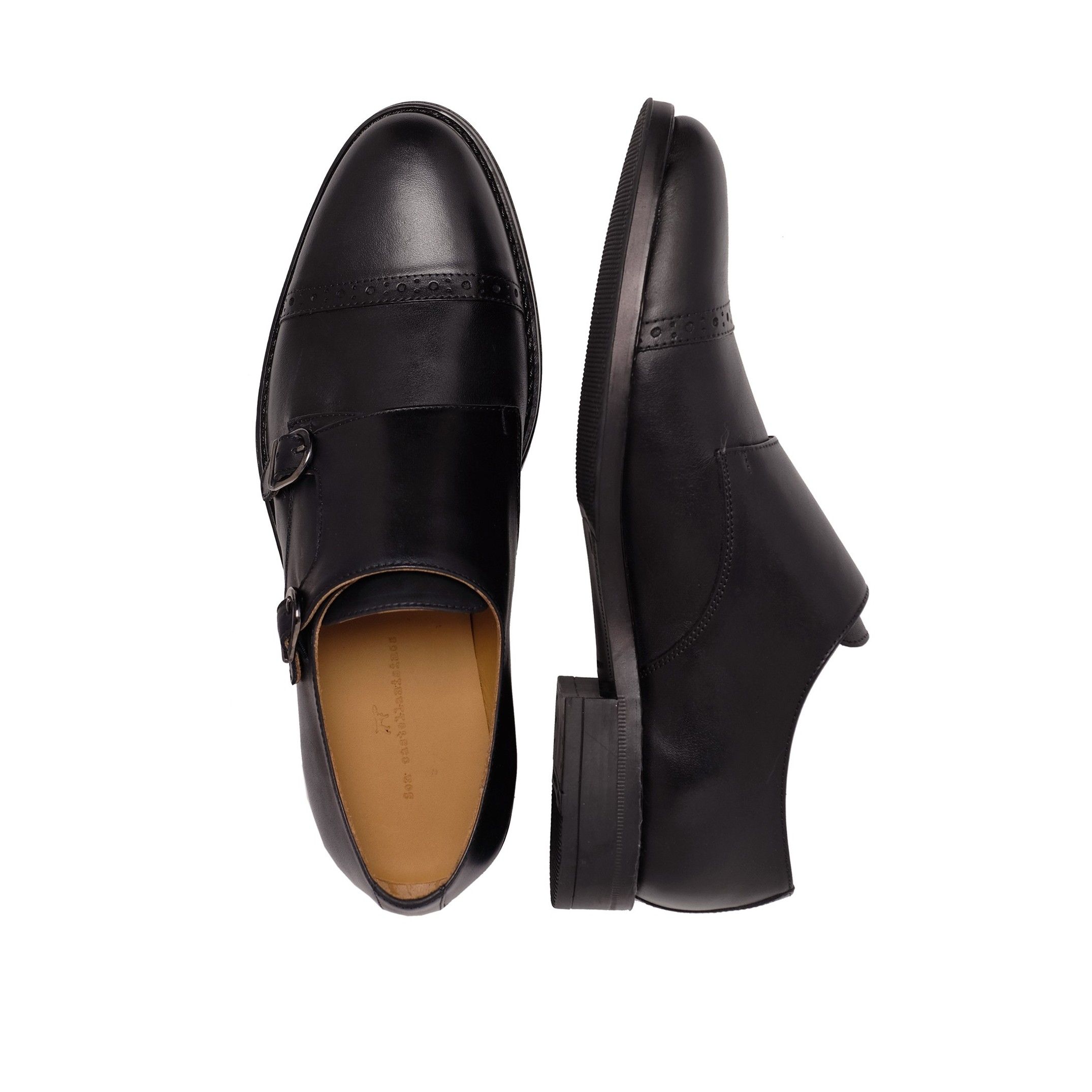 Monkstrap shoes in florentic leather. Closure: metalic buckle. Upper: florentic leather. Inner and insole: leather. Sole: Synthetic leather (better in durability and waterproofness). MADE IN SPAIN.