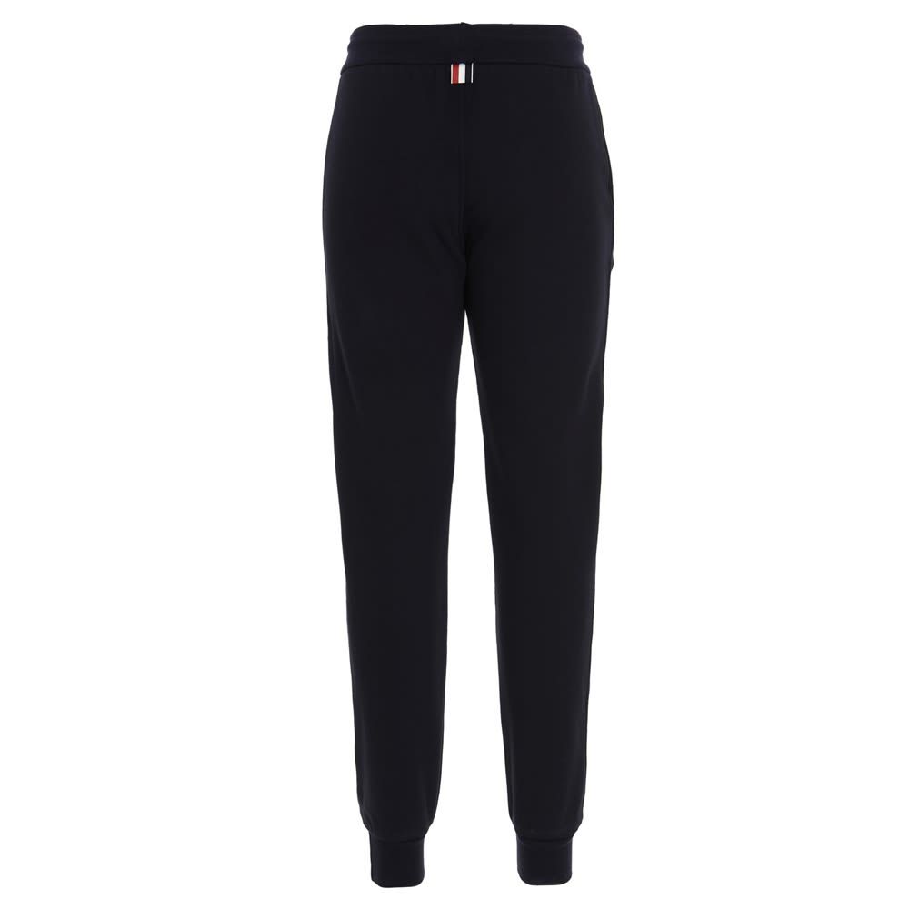 Thom Browne 'Classic loopback' cotton joggers with a side band detail and a logo tag.