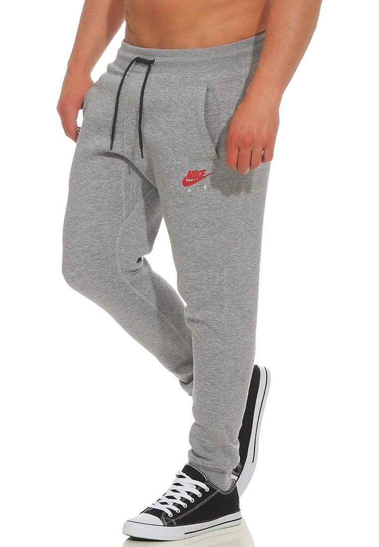 Nike Air Slim Fit Joggers Grey.     
Nike Air Logo Near Left Pocket.    
Two Side Pockets, Single Back Pocket.   
Soft-brushed Fleece Lined Fabric.    
Elasticated Waist With Drawstring.  
Elasticated Hems.