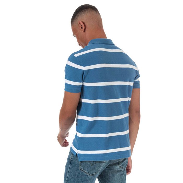 Mens Levi’s Good Polo Shirt in blue.<BR><BR>- Ribbed polo collar.<BR>- 3 button placket.<BR>- Short sleeves with ribbed cuffs.<BR>- Allover stripe design.<BR>- Embroidered Levi’s housemark logo at left chest.<BR>- Soft and comfortable cotton piqué fabric.<BR>- Standard fit.<BR>- 100% Cotton. Machine washable.<BR>- Ref: 24574-0029
