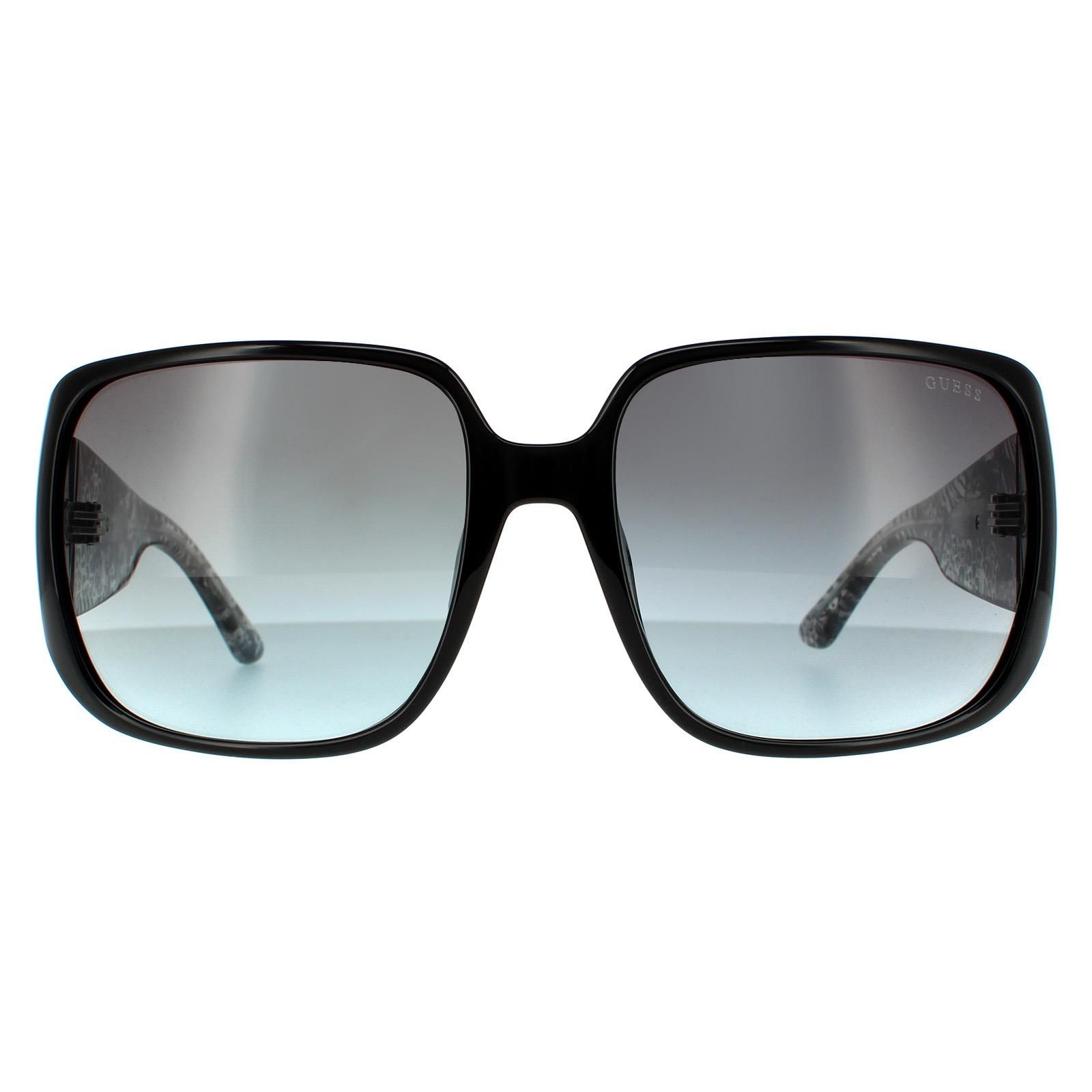 Guess Butterfly Womens Shiny Black Smoke Grey Gradient Sunglasses GU7682 are a lovely oversized style with uniquely patterned temples for a strong fashionable look.