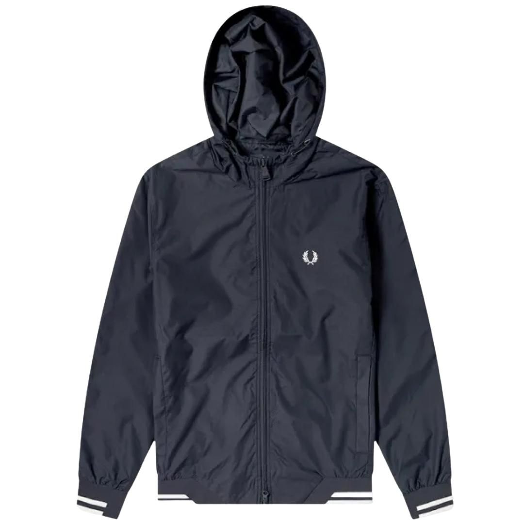 Fred Perry J7500 608 Navy Blue Bomber Jacket. Fred Perry Blue Jacket. 100% Polyamide. 2 Side Pockets. Elasticated Sleeve and Hem. Style: J7500 608