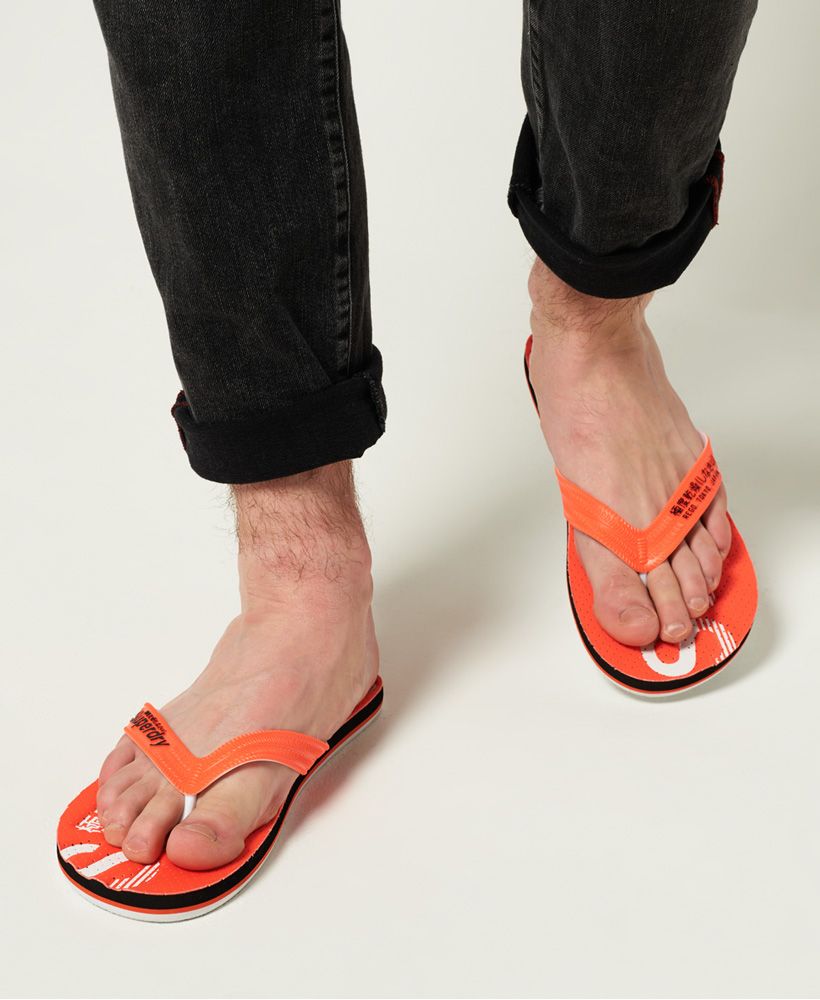 Superdry men's Scuba perforated flip flops. Complete any outfit this summer with the Scuba perforated flip flops, featuring textured straps with logo detailing and a branded sole.S - UK 6-7, EU 40-41, US 7-8M - UK 8-9, EU 42-43, US 9-10L - UK 10-11, EU 44-45, US 11-12XL - UK 12-13, EU 46-47, US 13-14