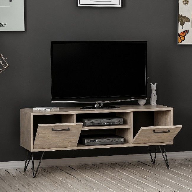 This elegant and functional TV cabinet is the perfect solution for television and all digital devices. Suitable for keeping accessories tidy. Thanks to its design it is ideal for the living area. Mounting kit included, easy to clean and easy to assemble. Color: Wood, Black | Product Dimensions: W120xD35xH50 cm, Legs 20 cm | Material: Melamine Chipboard, Metal | Product Weight: 21 Kg | Supported Weight: 15 Kg | Packaging Weight: 23,2 Kg | Number of Boxes: 1 | Packaging Dimensions: W144xD47xH11 cm.