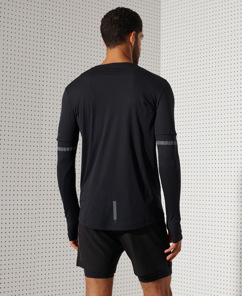 Part of our key Running Sport Performance range, this top is made from a feather lightweight material, enabling you to remain cool and perform at your best for longer. Designed to keep you safe, the Feather Weight Run long sleeve top features reflective detailing on both sleeves and the rear to ensure you are visible at all times when on your evening run this season.Slim: Fits close to your body, enabling you to show off that perfect formLightweight designCrew necklineLong sleevesThumbholesSplit side seamsDrop back hemReflective logo and strips