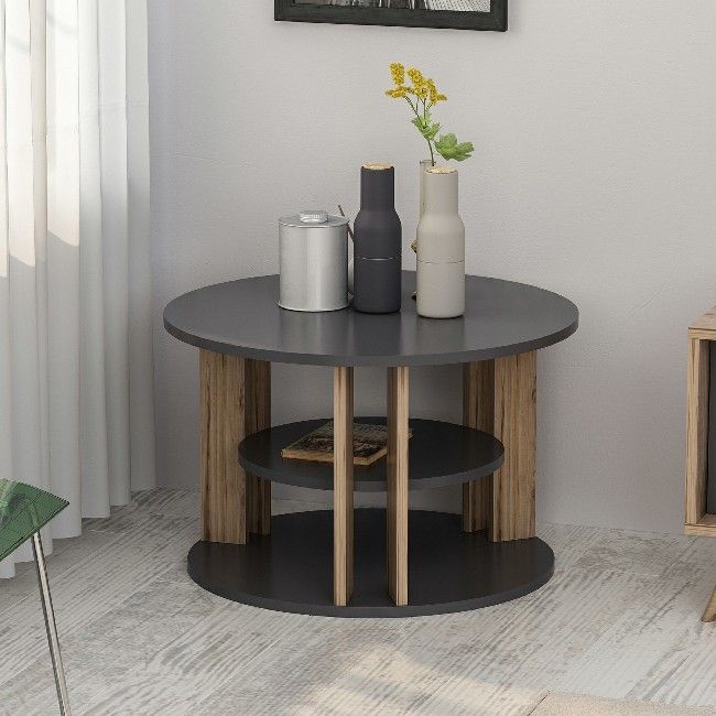 This stylish and functional coffee table is the perfect solution for furnishing the living area and keeping magazines and small items tidy. Easy-to-clean, easy-to-assemble kit included. Color: Walnut, Anthracite | Product Dimensions: W68xD68xH44 cm | Material: Melamine Chipboard | Product Weight: 10,7 Kg | Supported Weight: 10 Kg | Packaging Weight: W73,5xD73,5xH5,7 cm Kg | Number of Boxes: 1 | Packaging Dimensions: W73,5xD73,5xH5,7 cm.