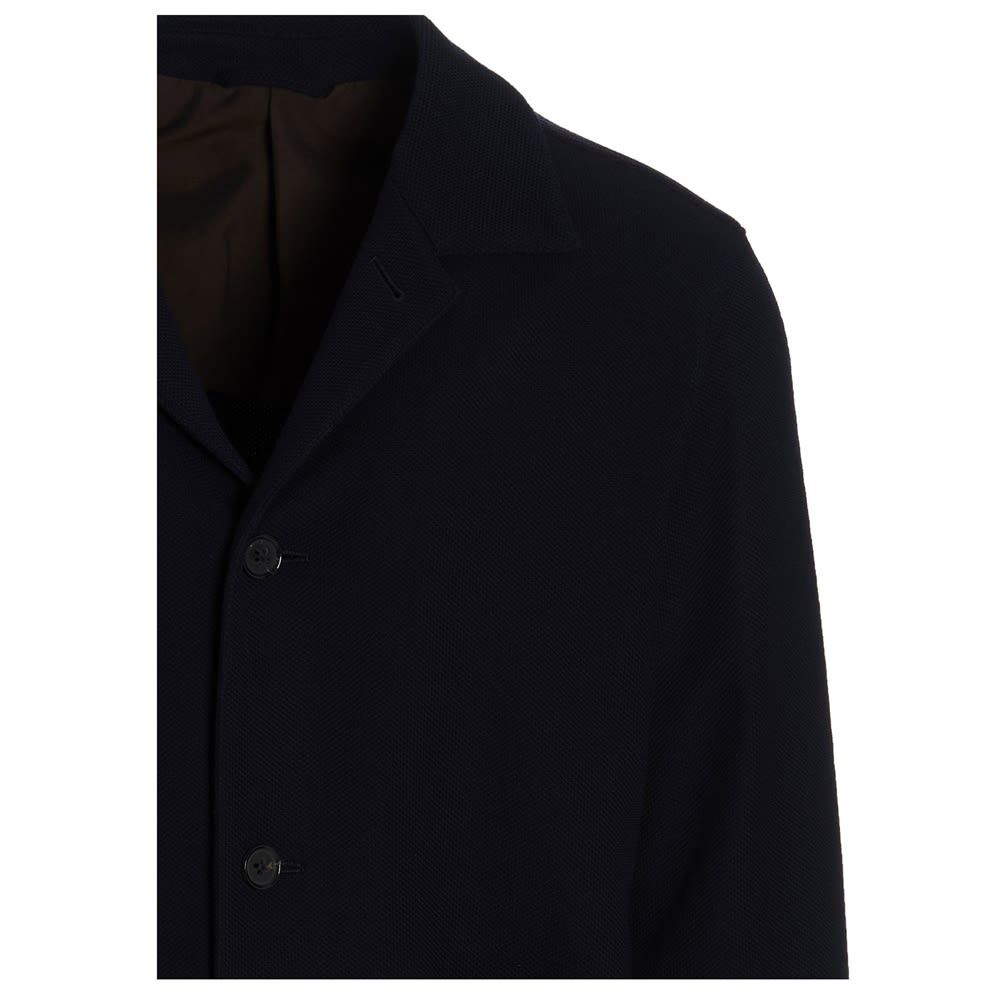Single breast knit blazer jacket with buttons, long sleeves, a comfort fit and a relaxed style.