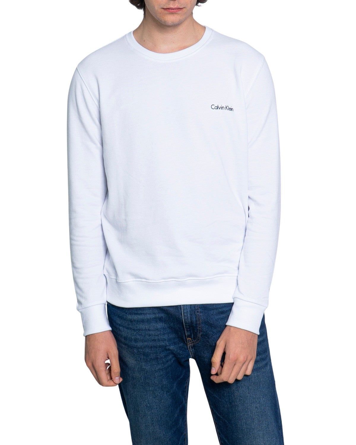 Brand: Calvin Klein Jeans Gender: Men Type: Sweatshirts Season: Spring/Summer  PRODUCT DETAIL • Color: white • Pattern: plain • Fastening: slip on • Sleeves: long • Neckline: round neck  COMPOSITION AND MATERIAL • Composition: -100% cotton  •  Washing: machine wash at 30° -100% Cotton