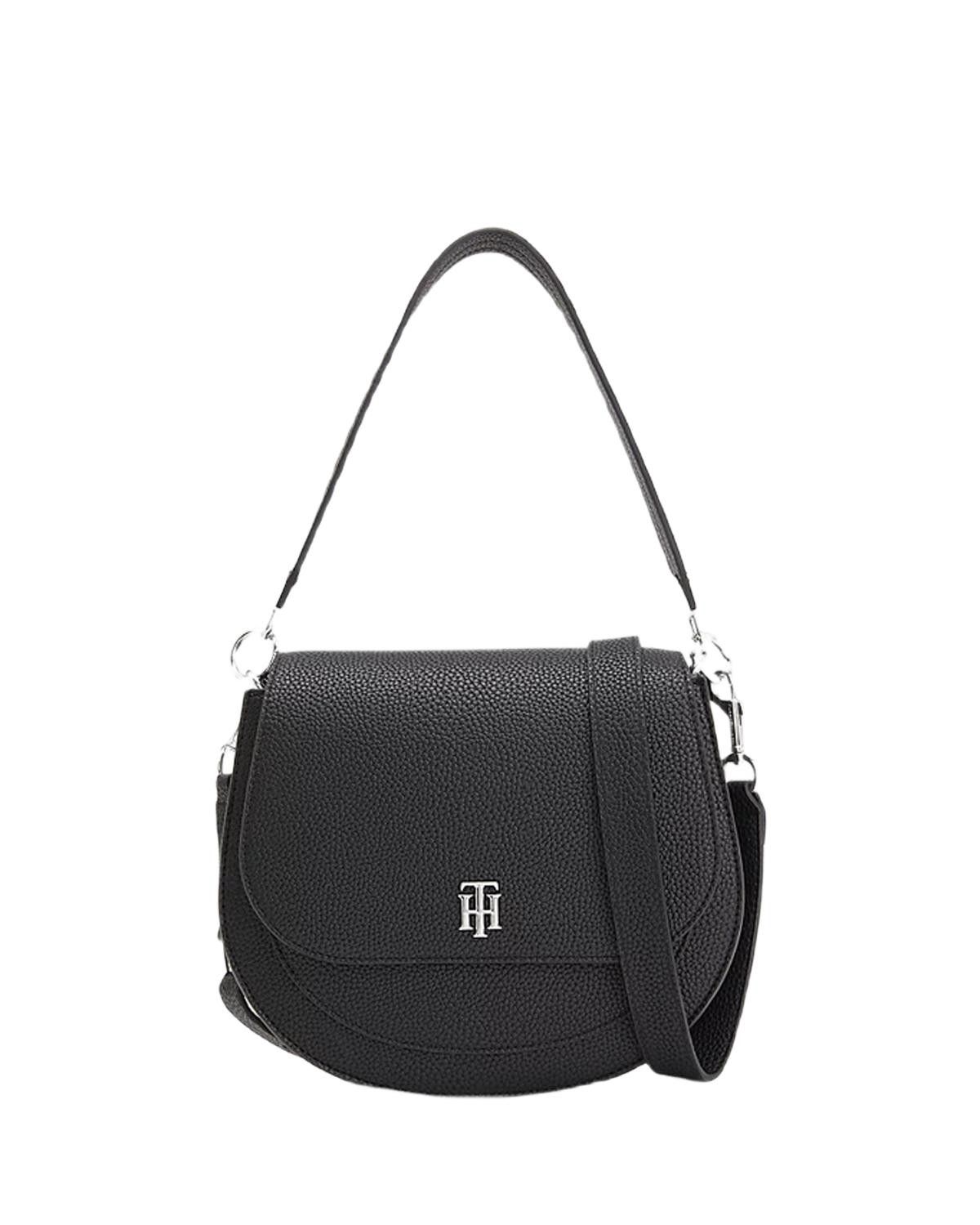 Womens black Tommy Hilfiger timeless saddle handbag, manufactured with polyurethane. Featuring: magnetic closure, adjustable shoulder strap, internal section, gold hardware and branded dust bag.