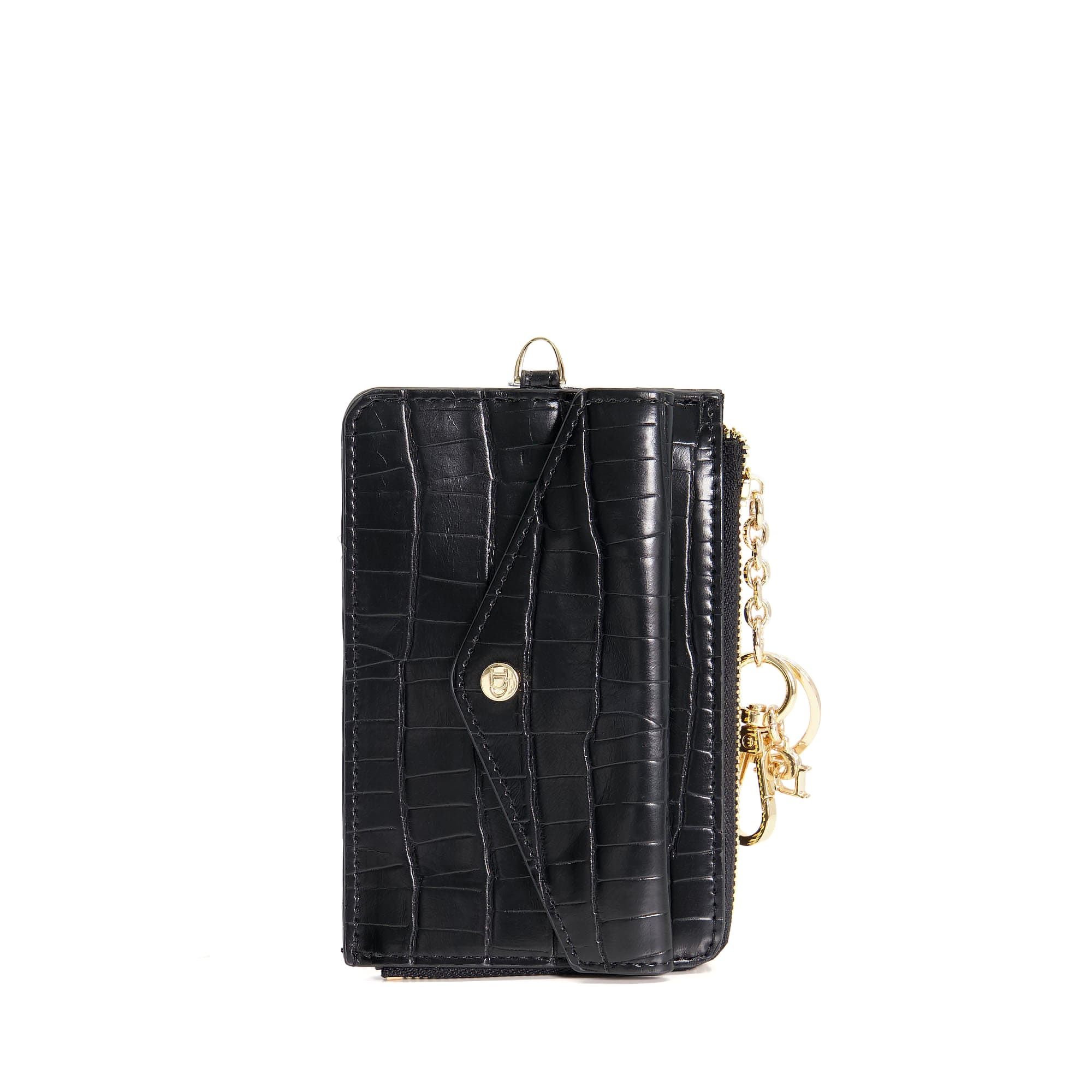 Stanton combines style with practicality, allowing you to carry your cards and change hands-free. This slimline piece has a chic croc-effect and a long strap to be worn around your neck. Just want Stanton for your handbag? Detach the strap easily usi