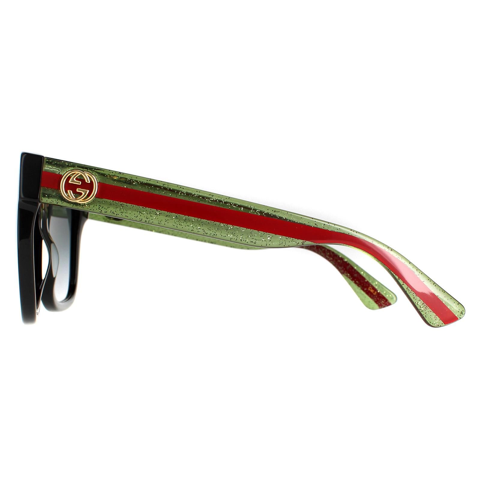 Gucci Square Womens Black With Green and Red Glitter Grey Gradient GG0034SN Sunglasses are a glamorous and oversized square shape frame. The thick acetate frame is lightweight and comfortable with Gucci's iconic GG metal logo at each of the temples. An exquisite style that will always stay on trend!